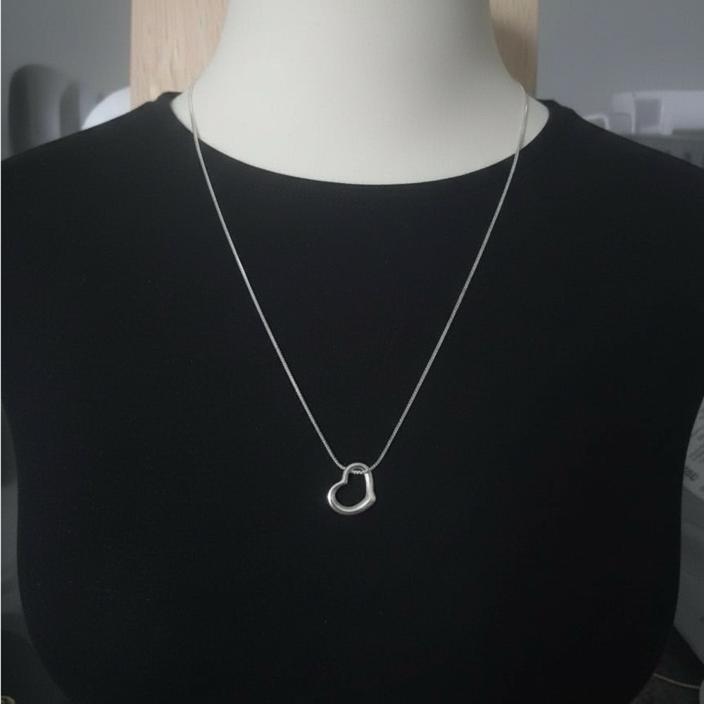 Tiffany & Co Silver Heart pendant and unbranded chain